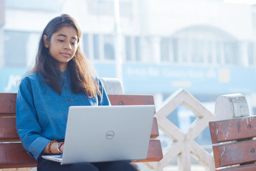 Freelancer working on a laptop outdoors