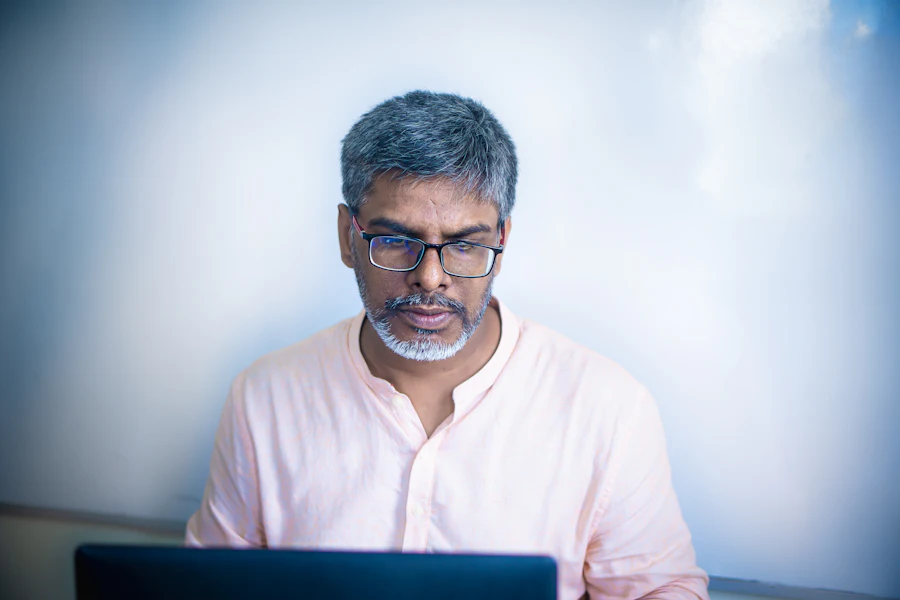 Freelancer reviewing work on a laptop
